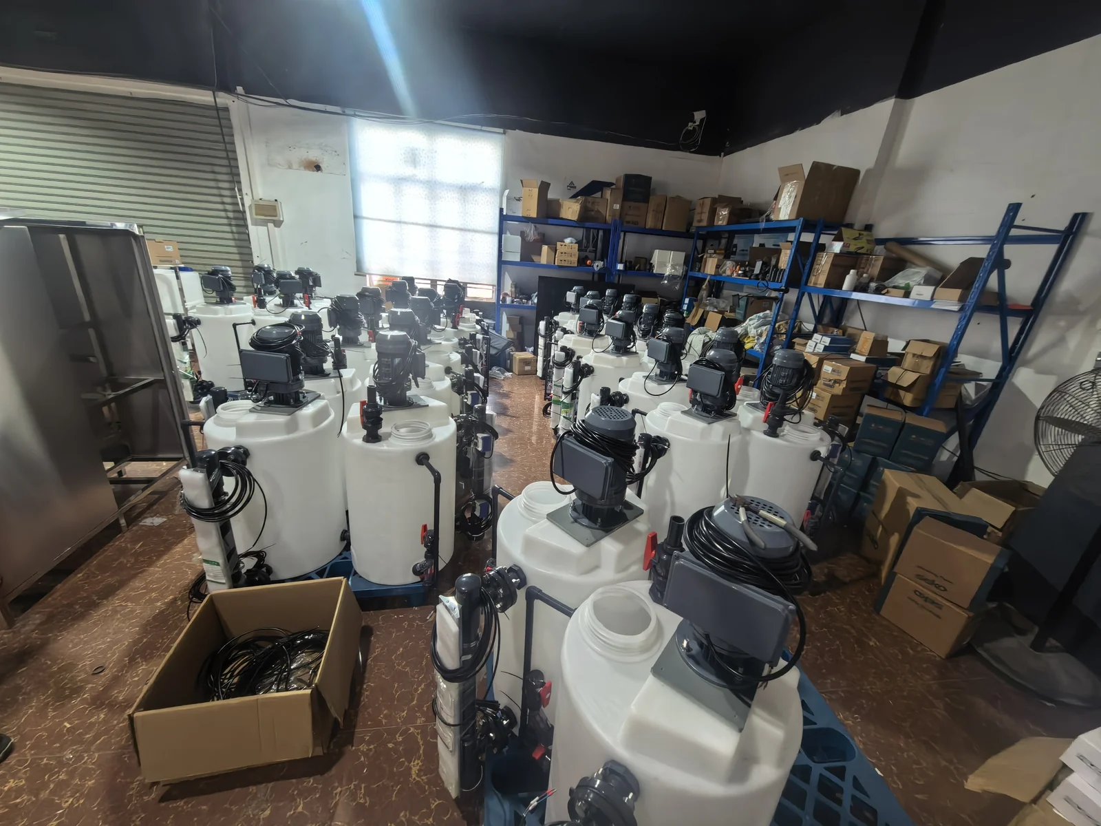 Tanks and pumps arranged as dosing equipment assemblies