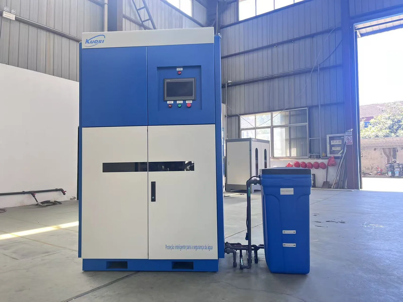 Blue and white sodium hypochlorite generator cabinet with associated equipment