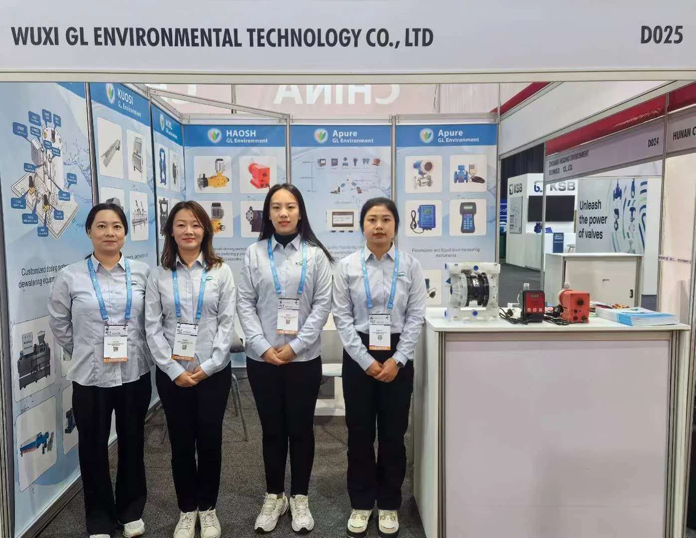 People at the Wuxi GL Environmental Technology booth marked D025